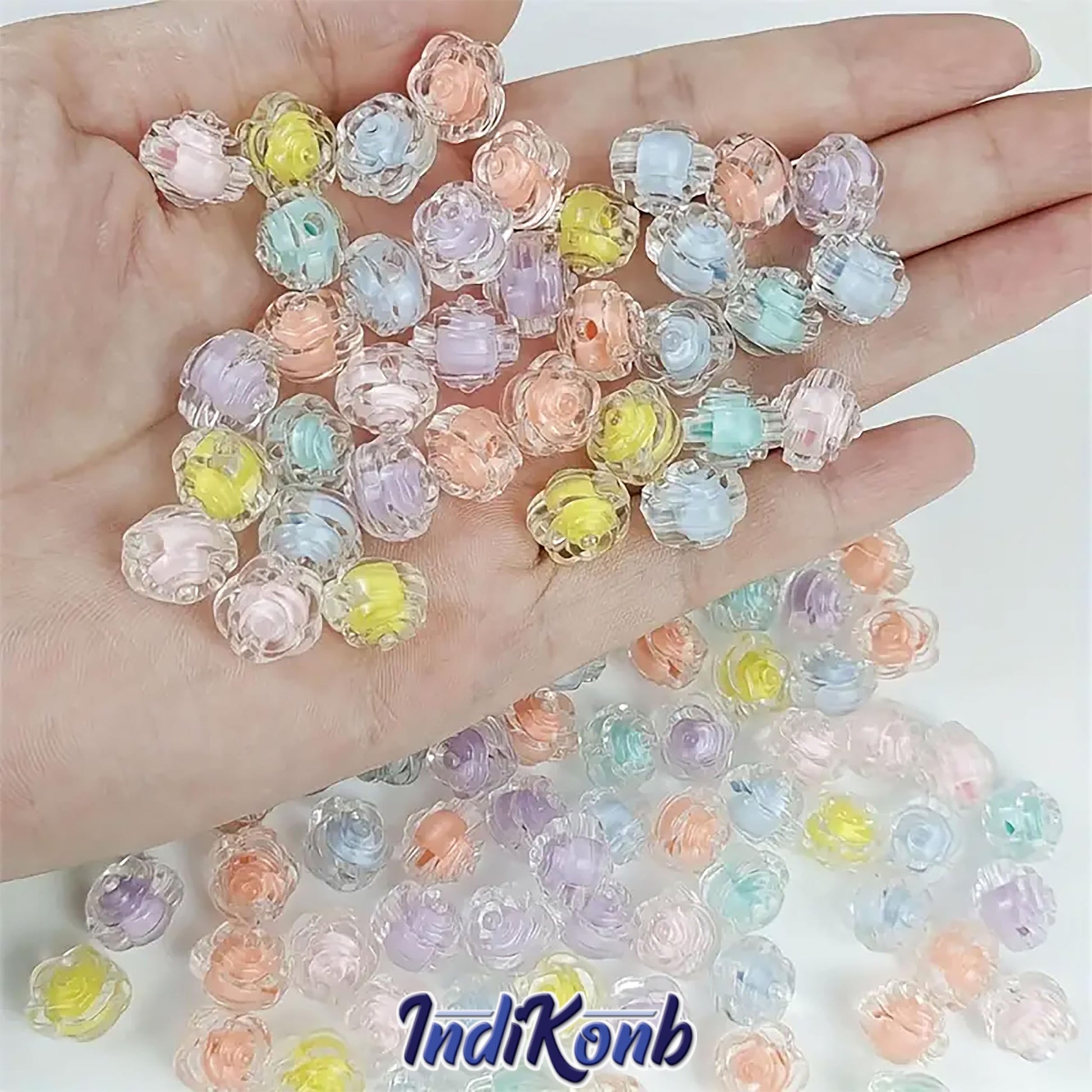 Handmade accessories and bracelet making benefits from flower beads and multicolour plastic and acrylic beads and projects a neat clean decorative finish.