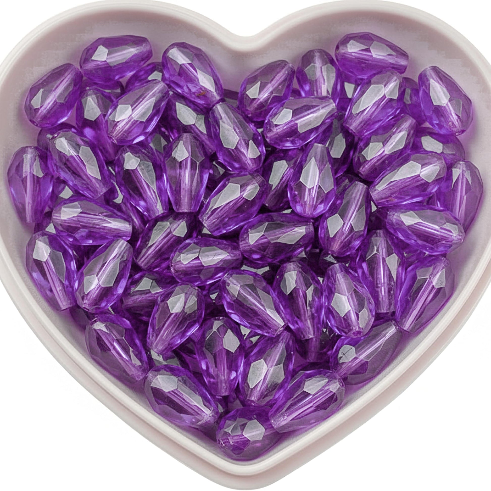 Add graceful dangle accents to earrings and charms with 10x6mm purple faceted teardrop beads.