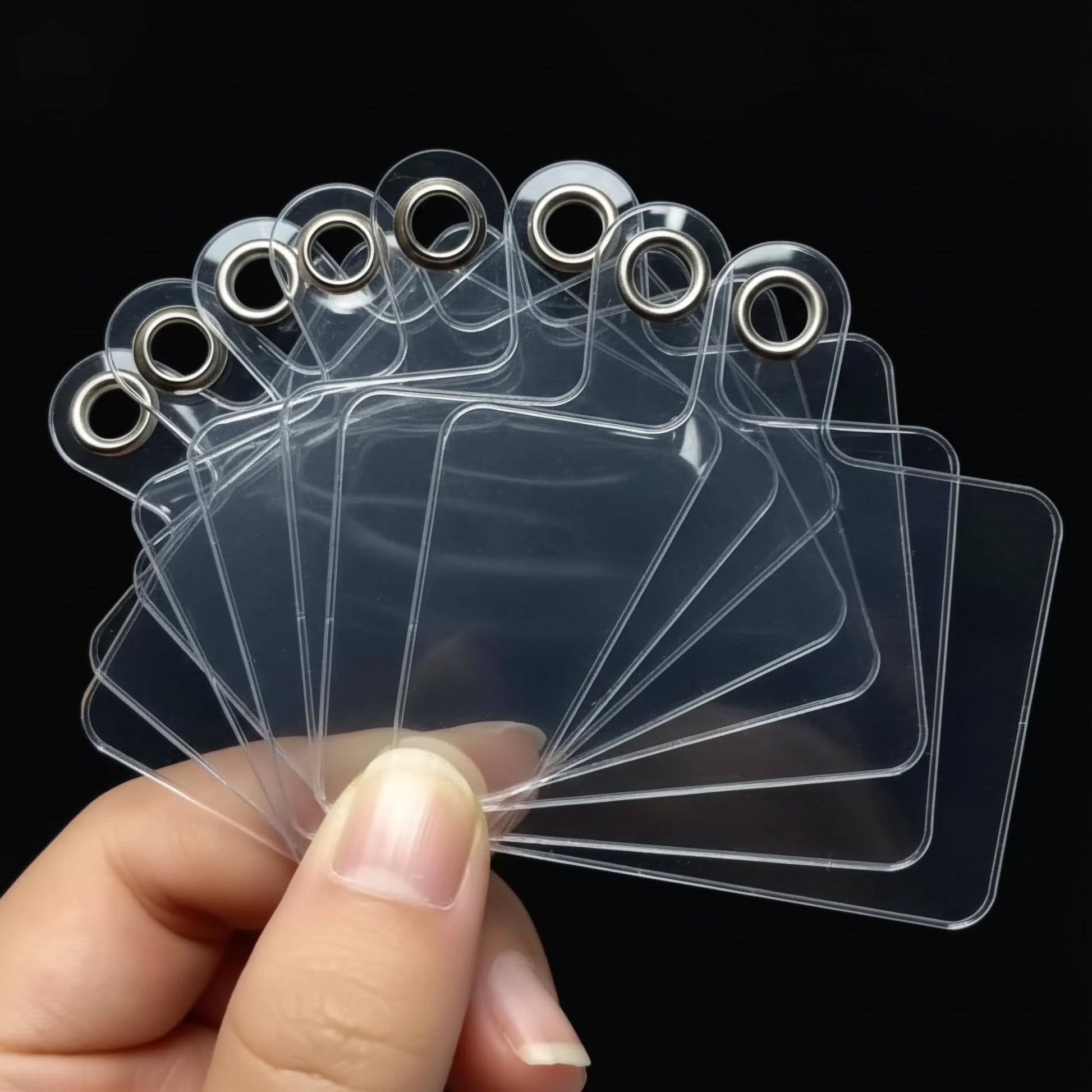 Let clear lanyard holder tabs add neat phone accessory style to phone charms and lanyard straps.