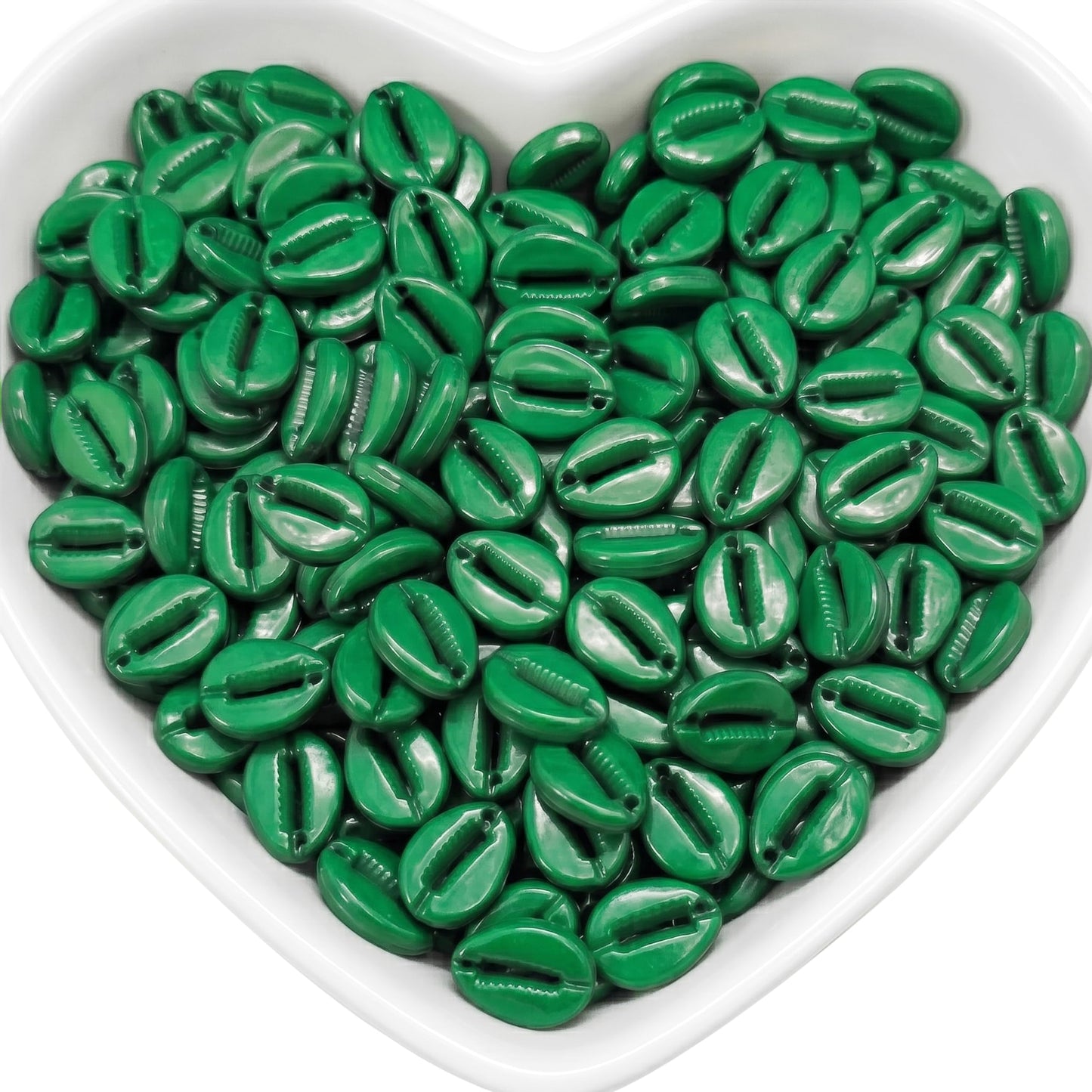 Create beach-inspired jewelry with dark green cowrie-style beads for charms, necklaces and crafts.