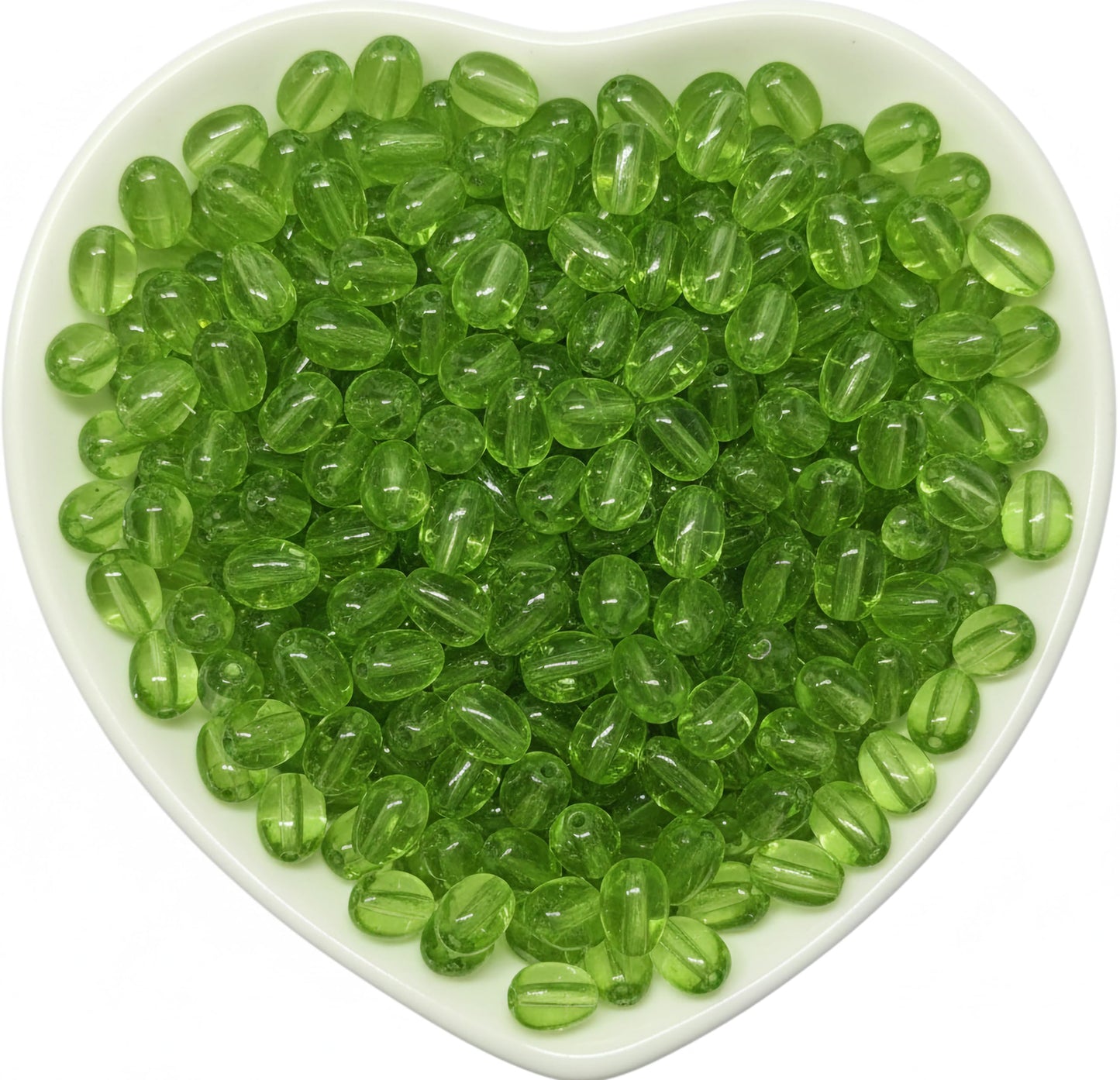 Use 8x5mm green transparent teardrop bead accents to add sparkle to latkan designs and DIY jewelry projects.