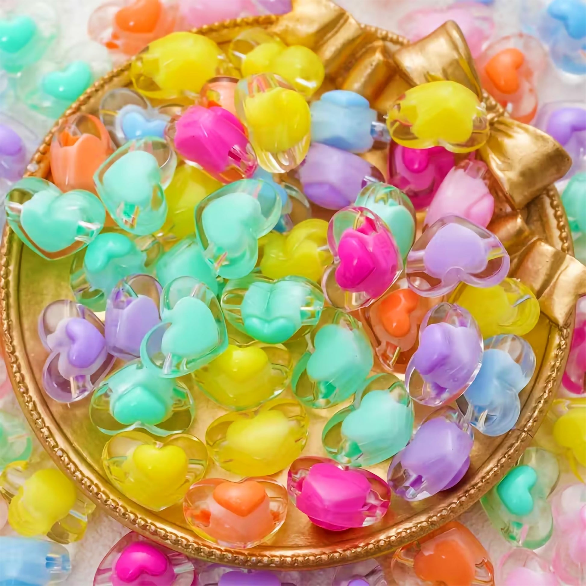 Multicolor Transparent Acrylic Heart Beads with Inner Crystal. Close-up image showing color, shape, finish, and texture details.