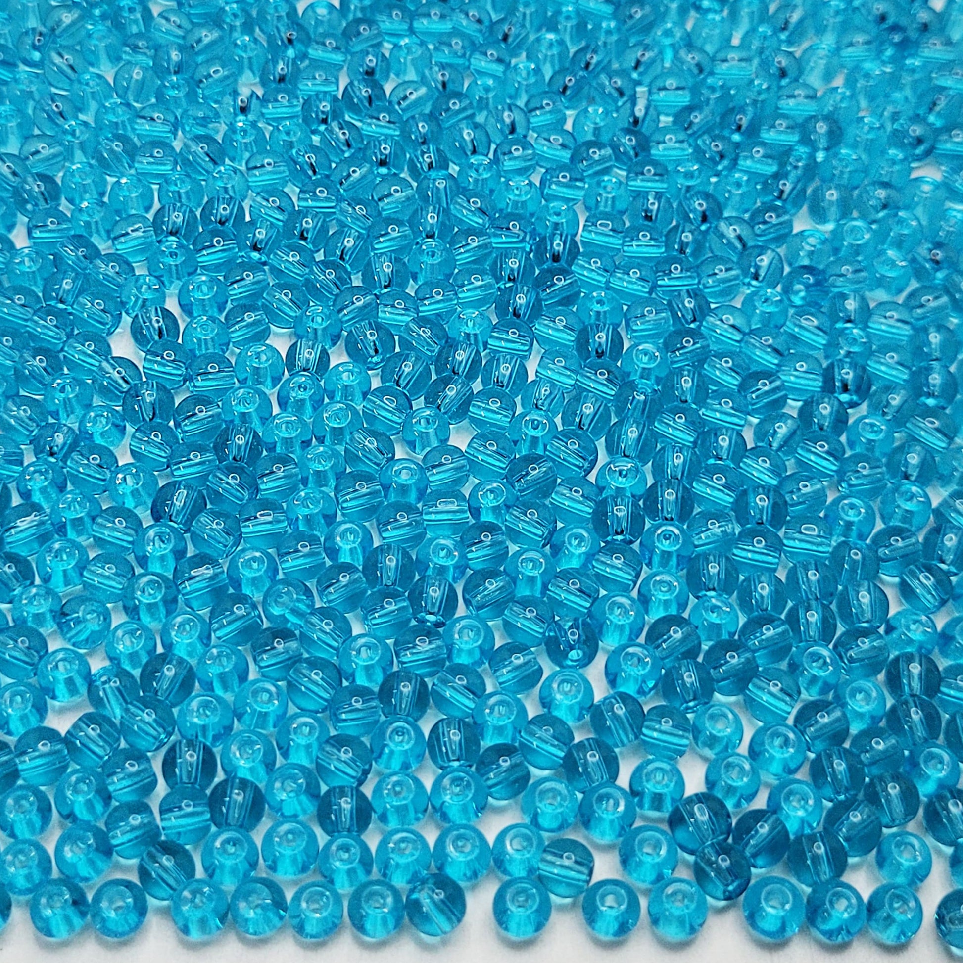 For neat results in bracelet making, necklace making and DIY jewellery projects, sea blue and multicolour 4mm beads are a useful detail.