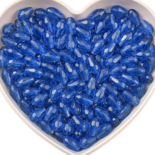 Add graceful dangle accents to earrings and charms with 15x10mm blue faceted teardrop beads.