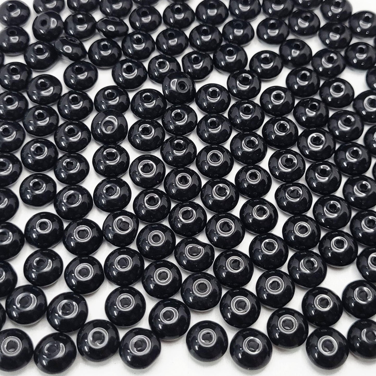 With black and white 3mm,4mm,6mm,8mm beads, necklace making gets a decorative beading finish.