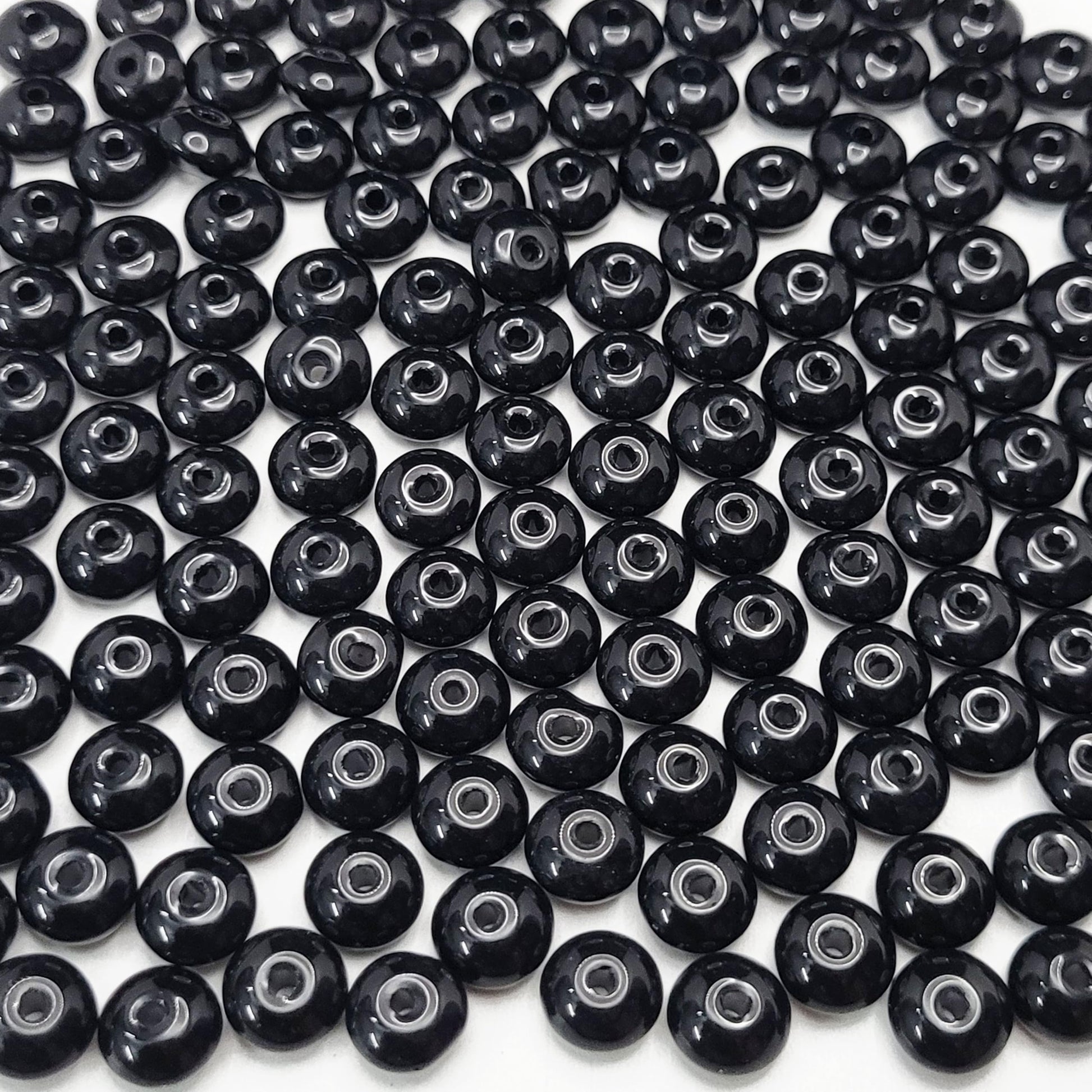 With black and white 3mm,4mm,6mm,8mm beads, necklace making gets a decorative beading finish.