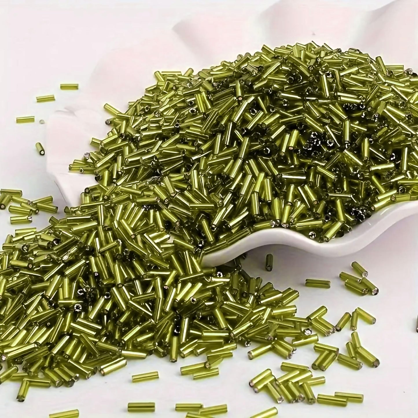 A refined detail for DIY craft projects, creative hobby work and decorative handmade designs, light green and silver 5mm bugle small cut cylinder silverline tubes 5mm shiny adds a.