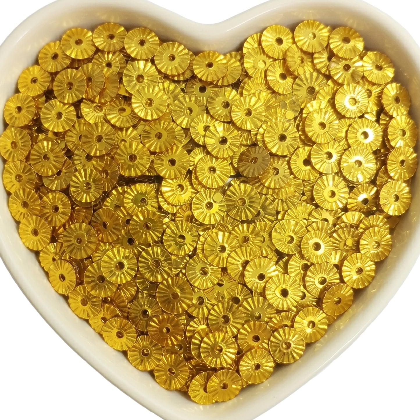 Festive gold flower chamki pieces turn aari embroidery into more expressive craft work.
