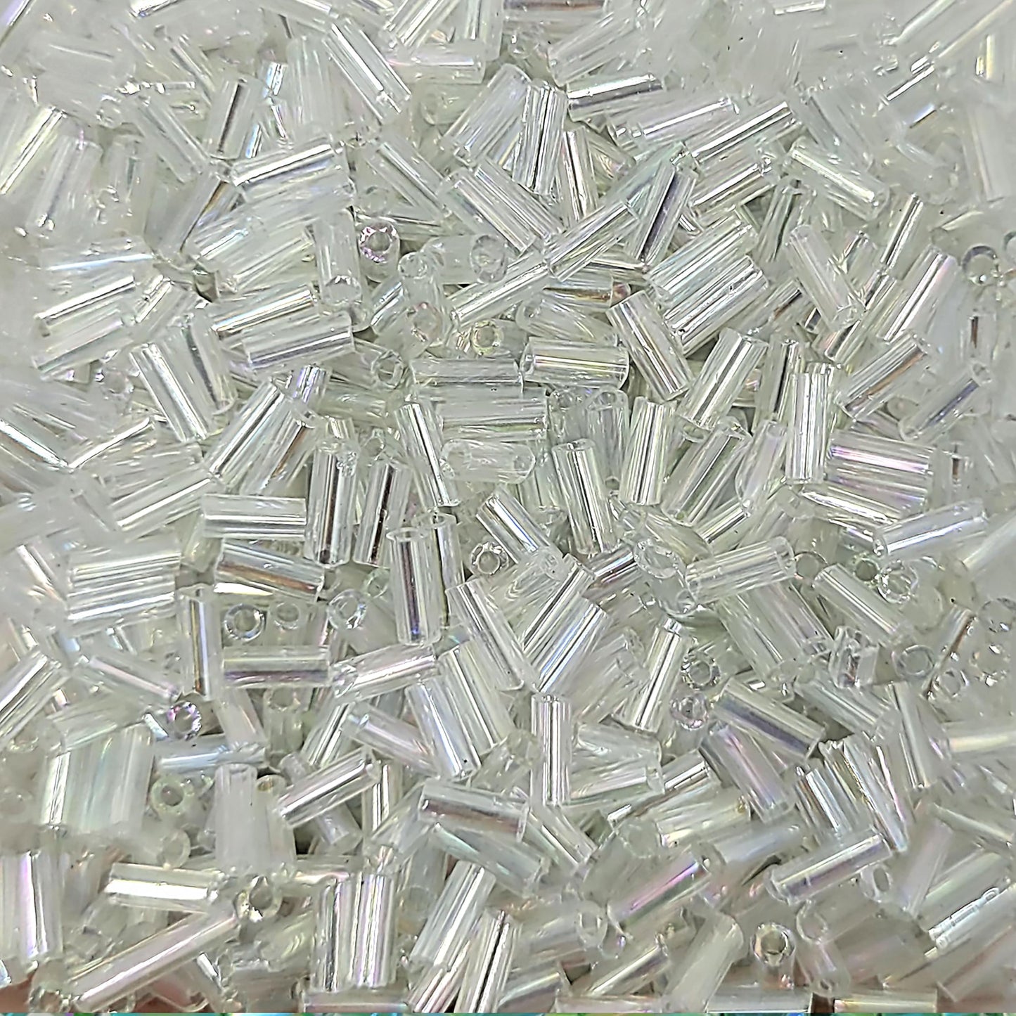 White and rainbow 5mm bugle small cut cylinder rainbow tubes 5mm shiny makes DIY craft projects, creative hobby work and decorative handmade designs look more complete.
