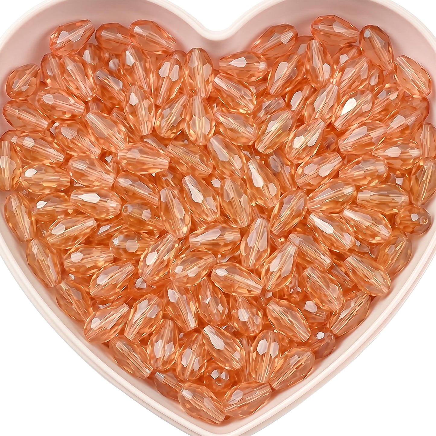 Add graceful dangle accents to earrings and charms with 15x10mm dark pink faceted teardrop beads.