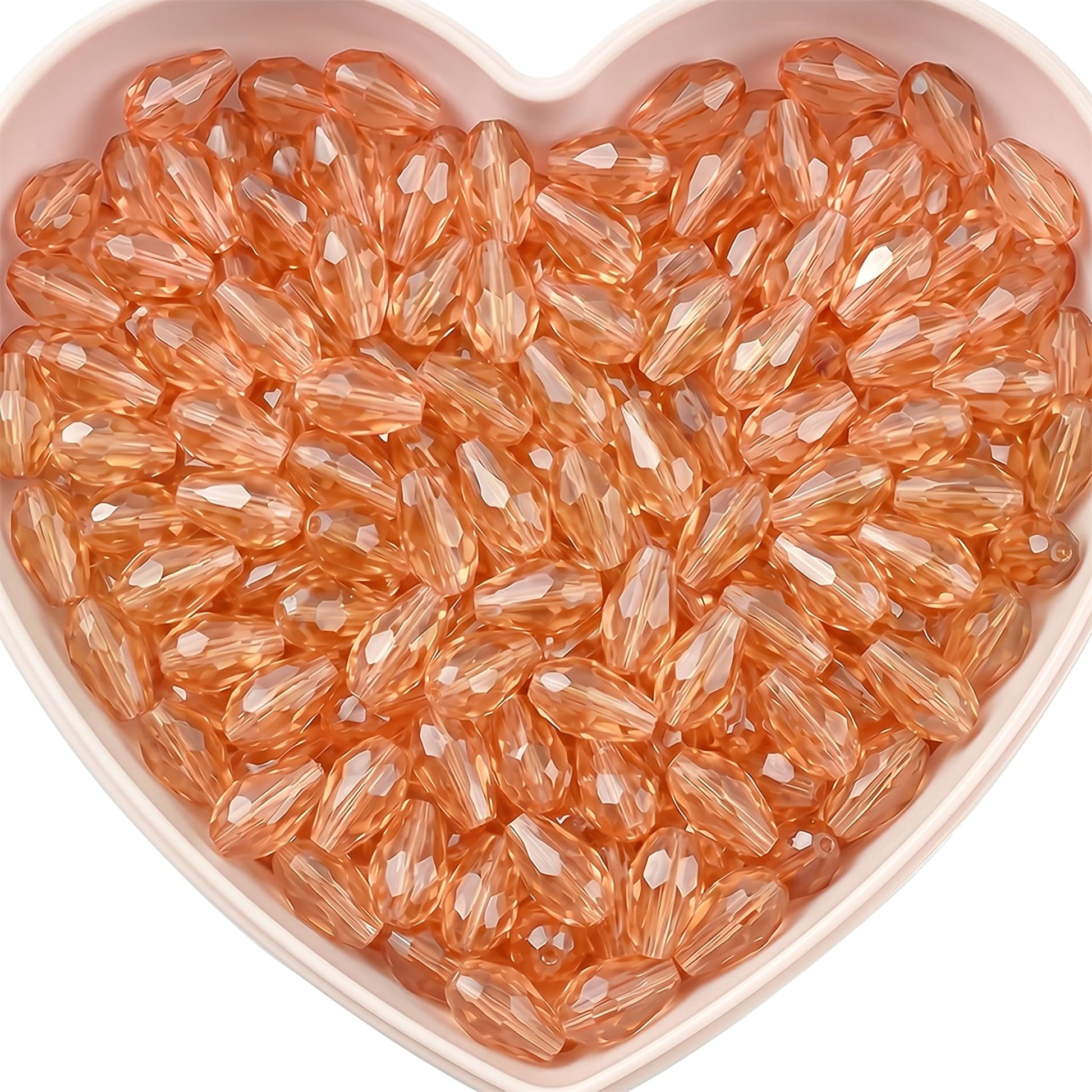 Add graceful dangle accents to earrings and charms with 15x10mm dark pink faceted teardrop beads.