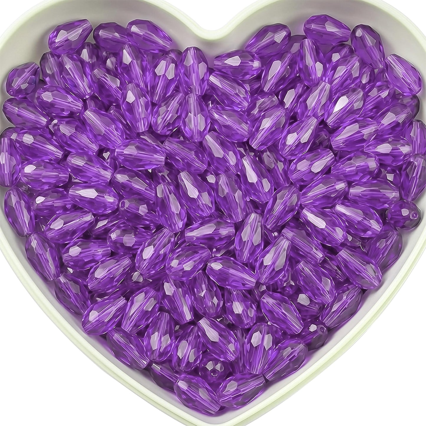 Add graceful dangle accents to earrings and charms with 15x10mm purple faceted teardrop beads.