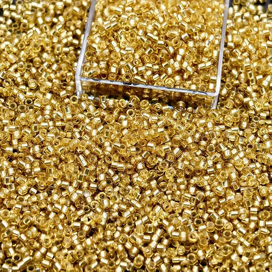 Light Gold Seed Beads 110 Silverline Finish Glass. Main product image showing the full assortment for jewelry making and craft work.