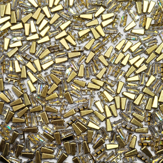 White 2x3x7 and multicolour rhinestone and stone rhinestones and flatback stones bring a polished accent to embellishment work, Lippan art and fabric decoration.