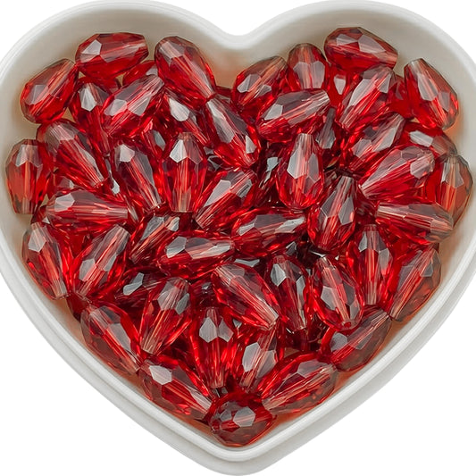 Add graceful dangle accents to earrings and charms with 10x6mm red faceted teardrop beads.