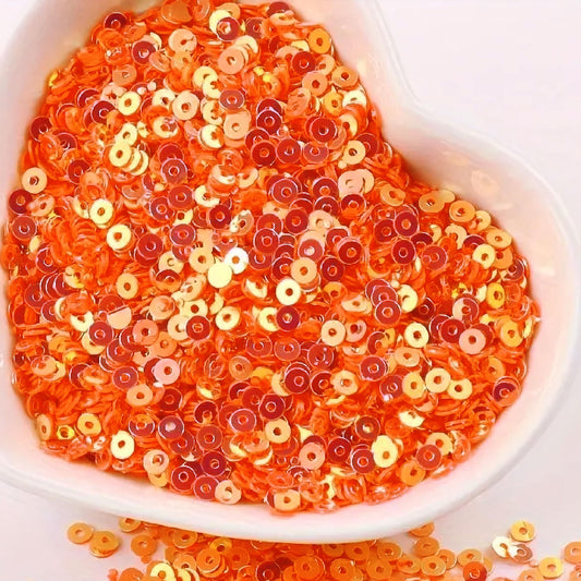For neat results in Embroidery for embroidery, craft decoration and fabric embellishment, orange 4mm sequins round shape 4mm sitara sequins with holes are a useful detail.
