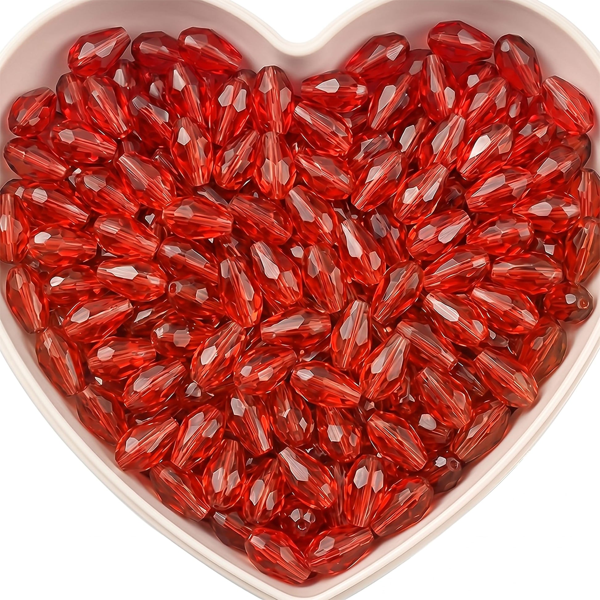 Add graceful dangle accents to earrings and charms with 15x10mm red faceted teardrop beads.