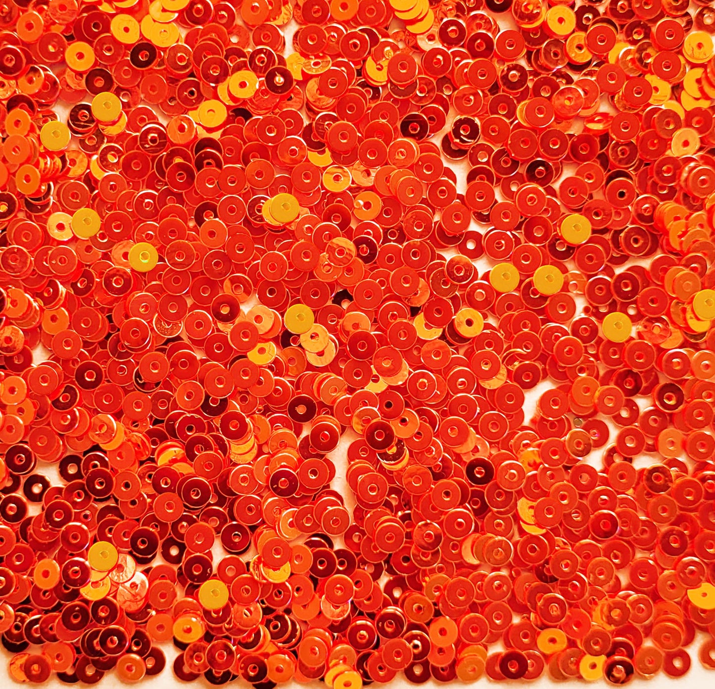 Red Shiny Round Shape Sequins. Main product image showing the full assortment for jewelry making and craft work.