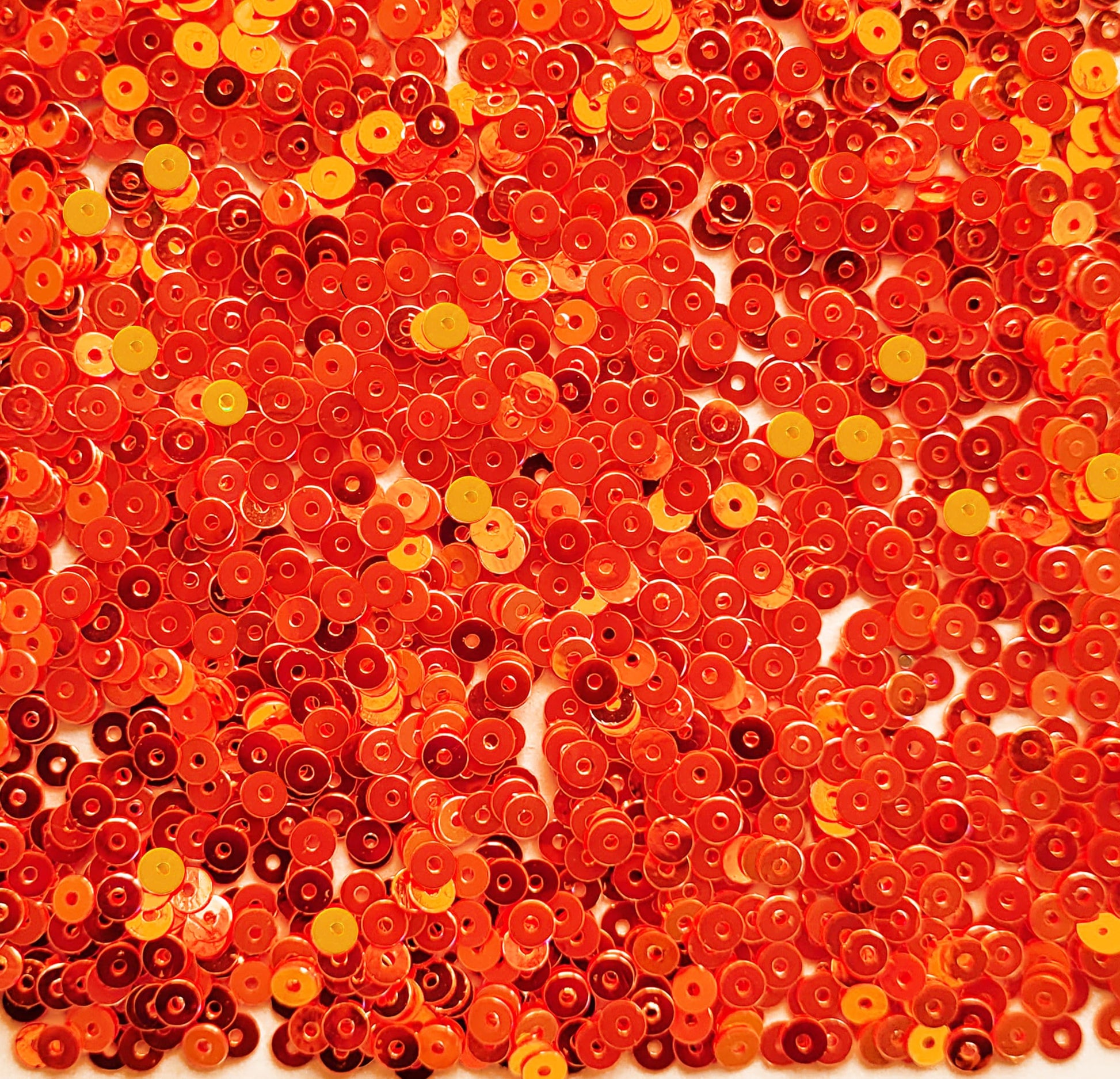 Red Shiny Round Shape Sequins. Main product image showing the full assortment for jewelry making and craft work.
