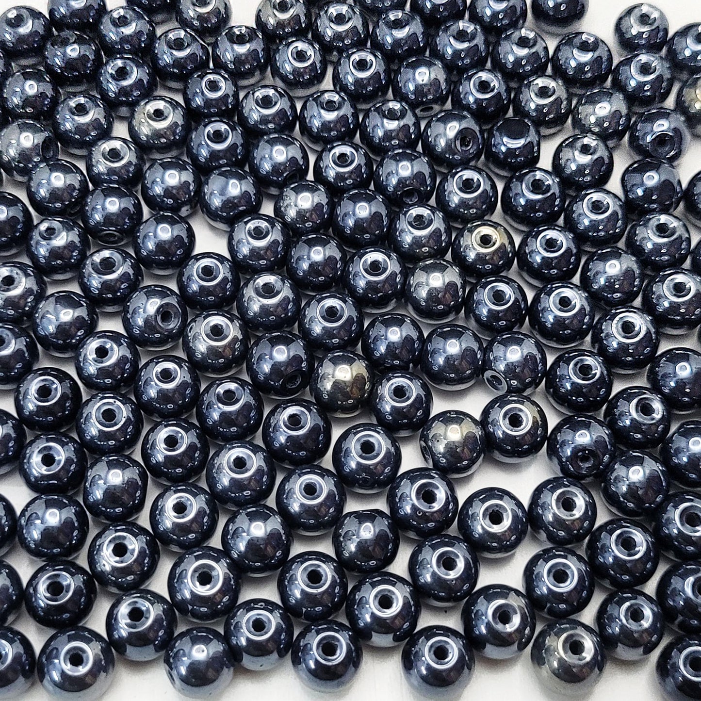 For DIY jewellery projects, black and white 3mm,4mm,6mm,8mm beads add a balanced decorative detail.