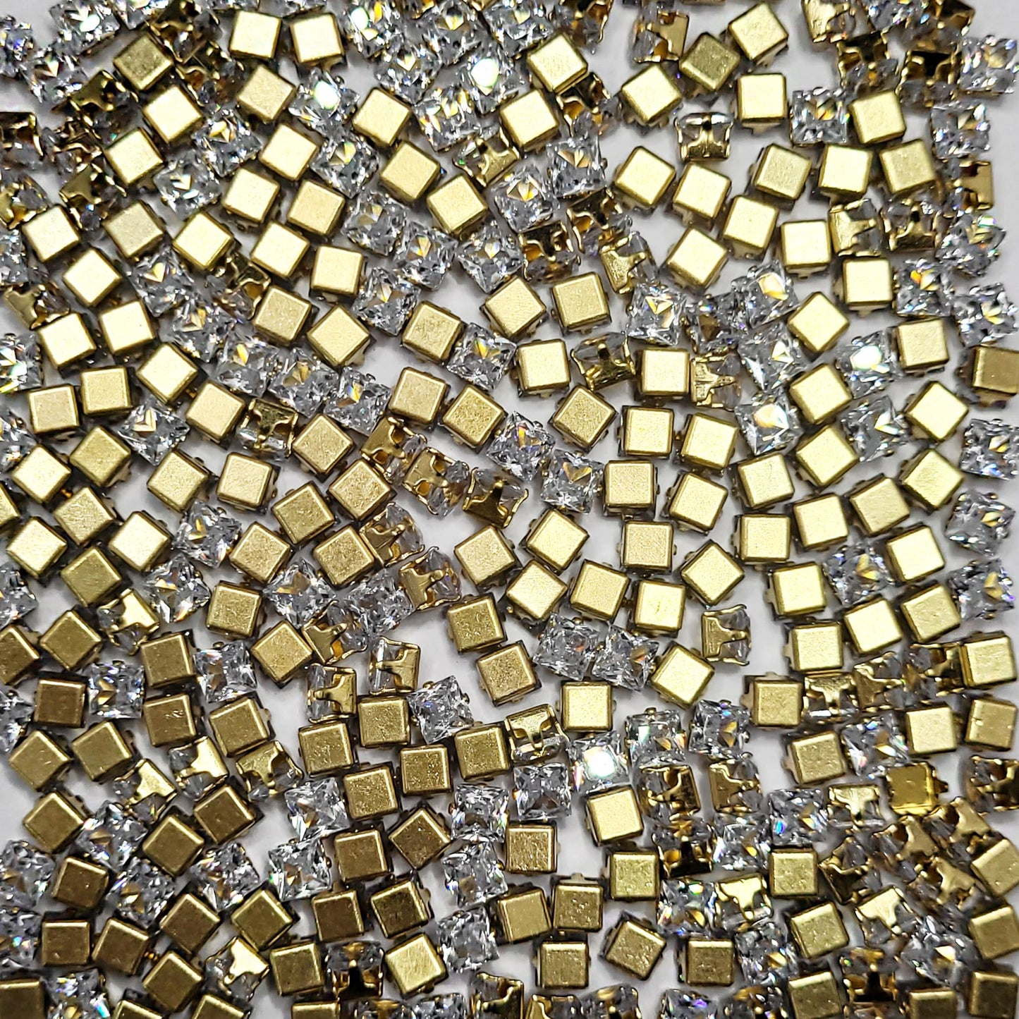 Square 4x4 and multicolour rhinestone and stone rhinestones and flatback stones make embellishment work, Lippan art and fabric decoration look more complete.
