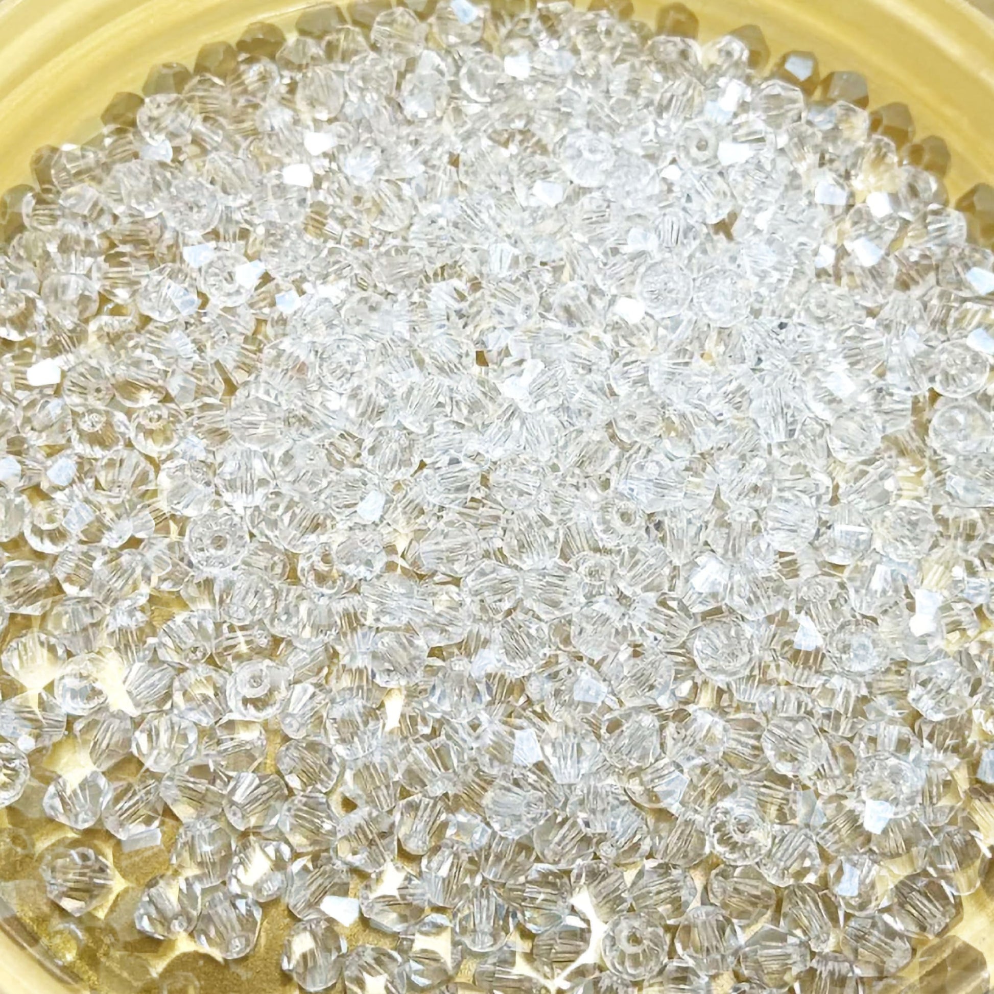 Bicone Acrylic Plastic Crystal-like Beads. Main product image showing the full assortment for jewelry making and craft work.