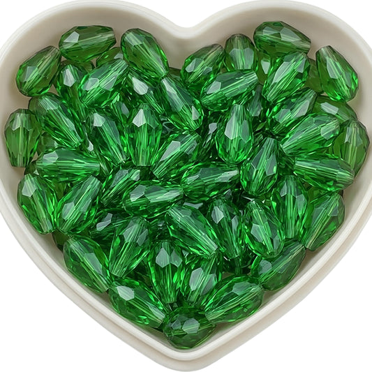 Add graceful dangle accents to earrings and charms with 10x6mm dark green faceted teardrop beads.