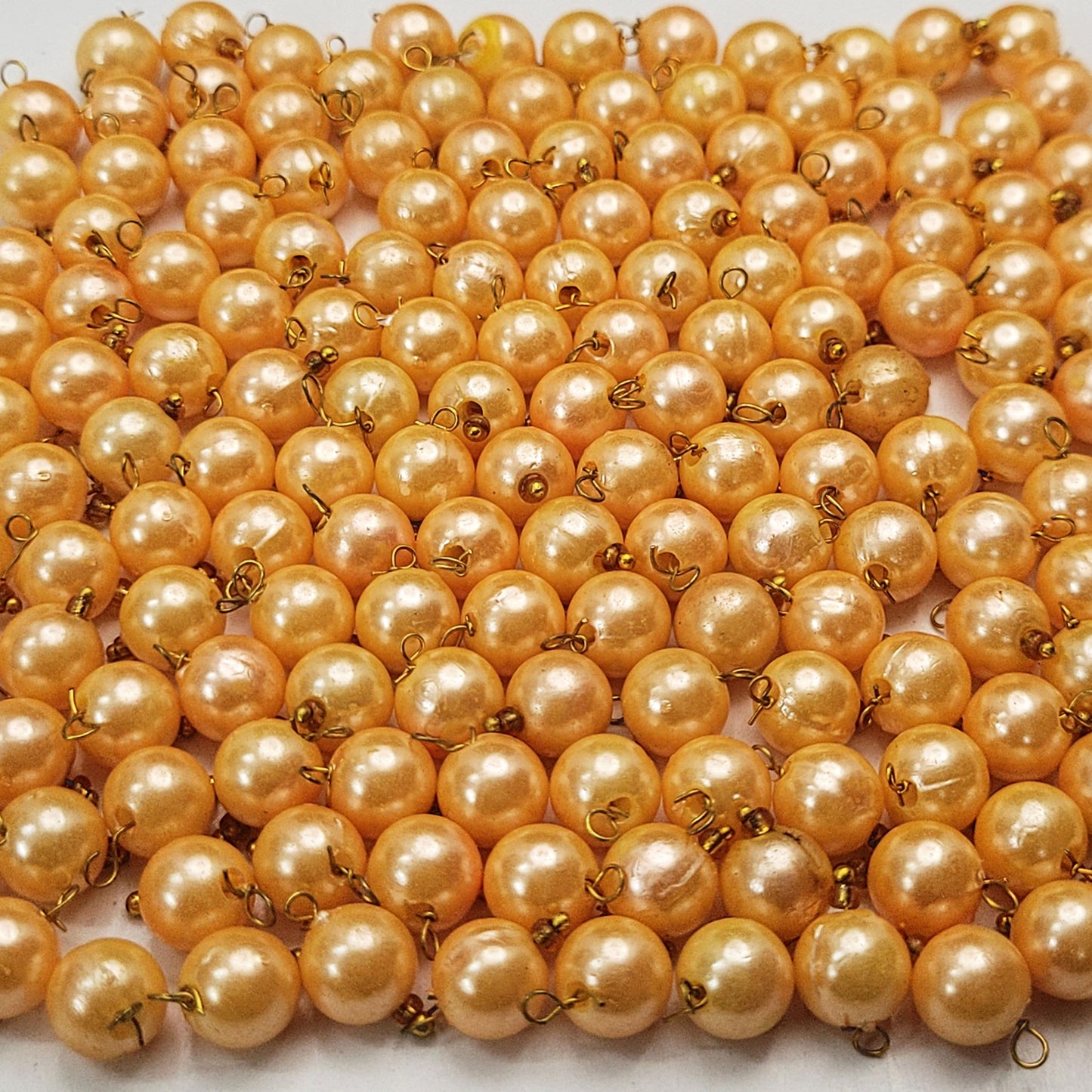Gold and multicolour 8mm beads are a clean finishing element for bracelet making, necklace making and DIY jewellery projects.