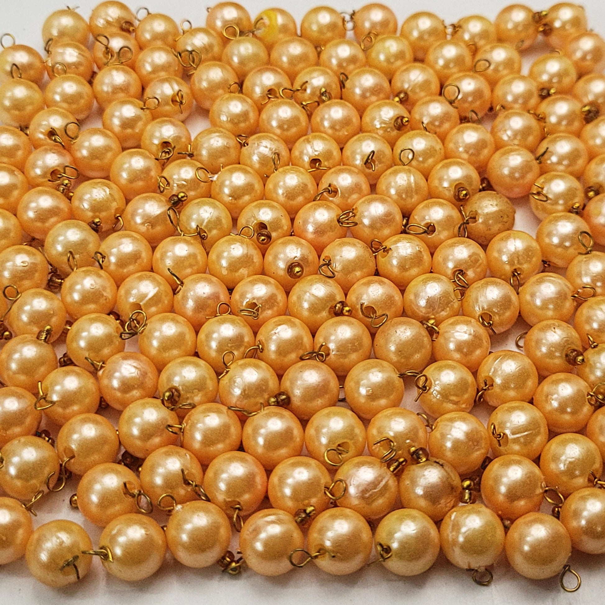 Gold and multicolour 8mm beads are a clean finishing element for bracelet making, necklace making and DIY jewellery projects.