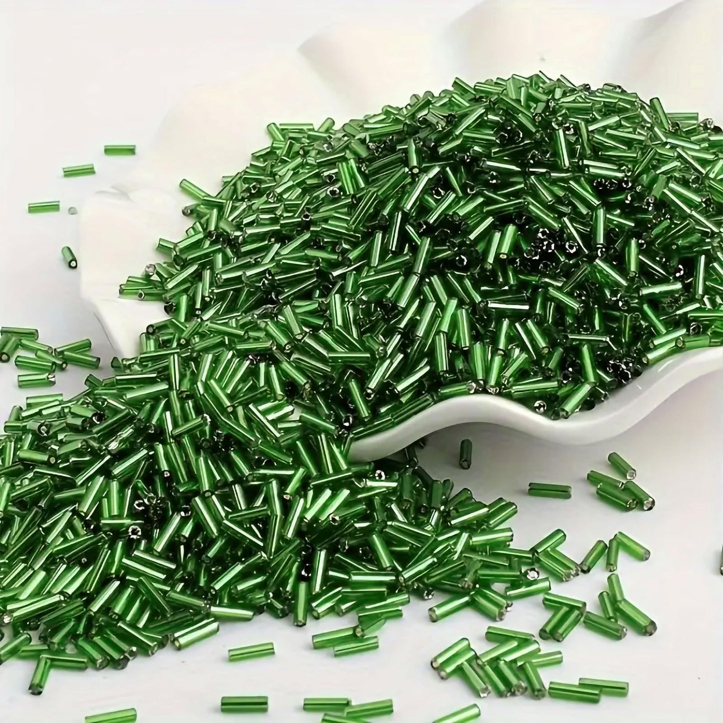 With green and silver 5mm bugle small cut cylinder silverline tubes 5mm shiny, DIY craft projects, creative hobby work and decorative handmade designs gets a clean.