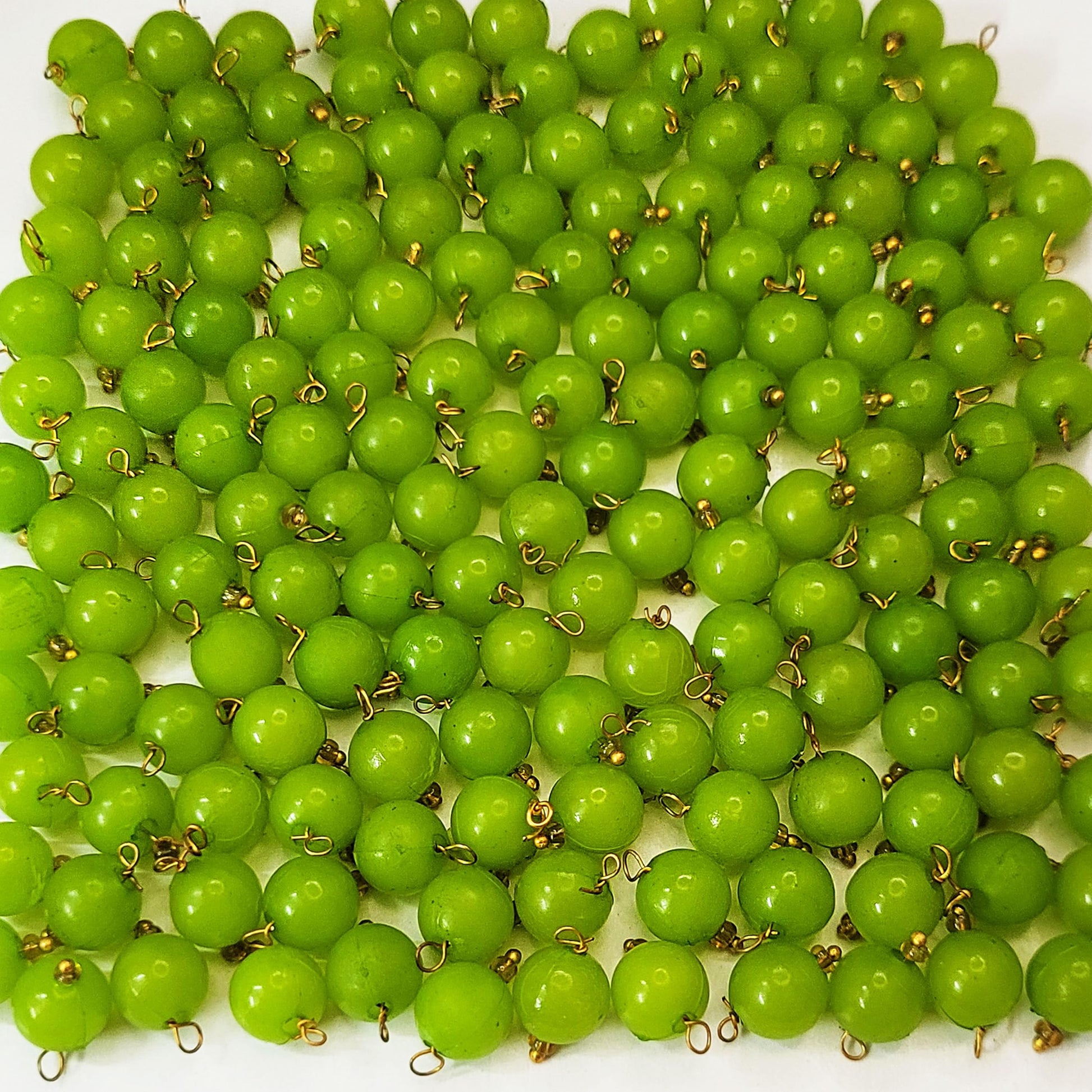 For bracelet making, necklace making and DIY jewellery projects, light green and multicolour 8mm beads add a balanced decorative detail.