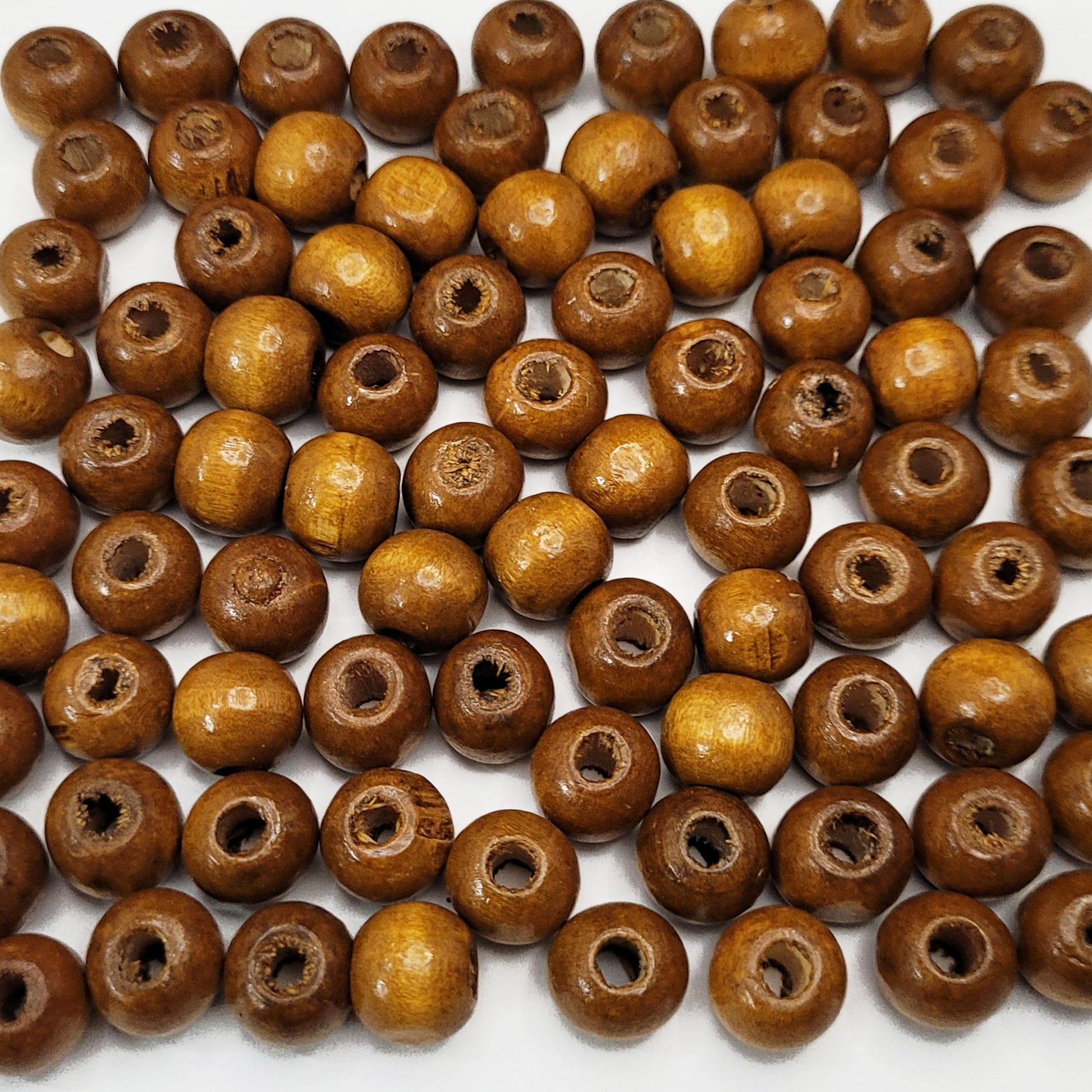Brown 8mm 8mm beads offer a clean decorative look for bracelet making, necklace making and DIY jewellery projects.