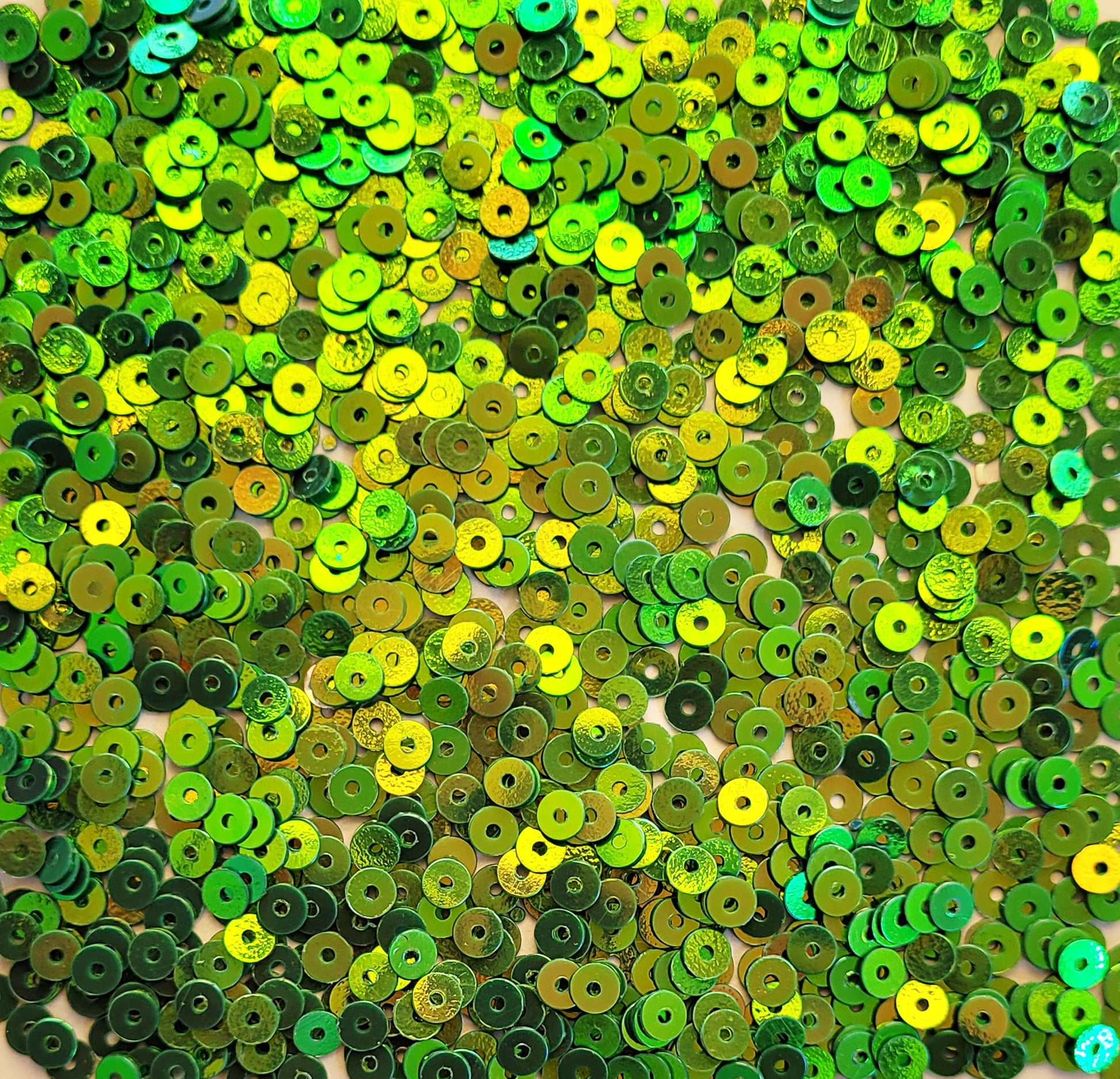 Green Shiny Sequins Round Shape. Main product image showing the full assortment for jewelry making and craft work.