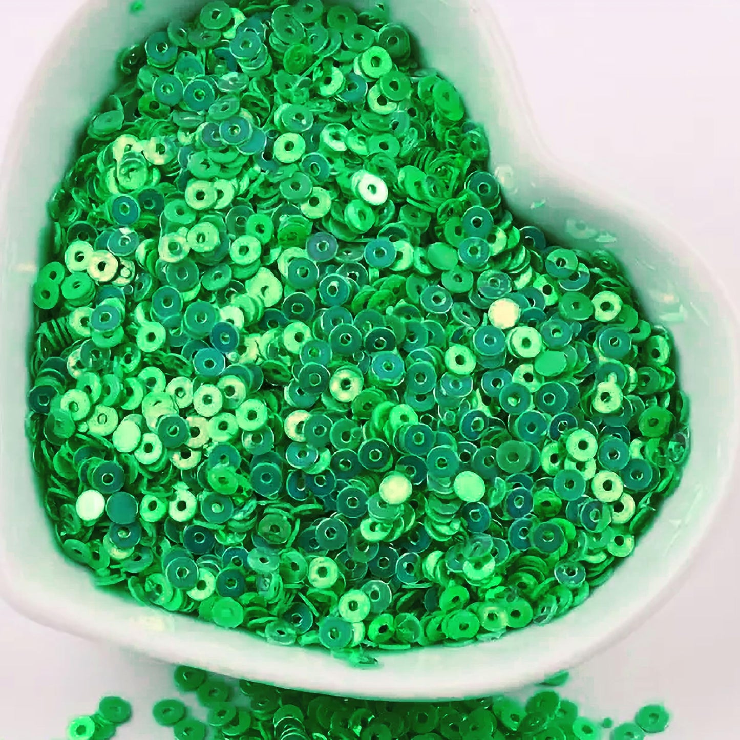 Green 4mm sequins round shape 4mm sitara sequins with holes are useful for detailed work in Embroidery for embroidery, craft decoration and fabric embellishment.