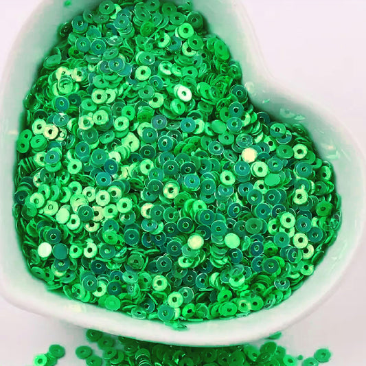 Green 4mm sequins round shape 4mm sitara sequins with holes are useful for detailed work in Embroidery for embroidery, craft decoration and fabric embellishment.