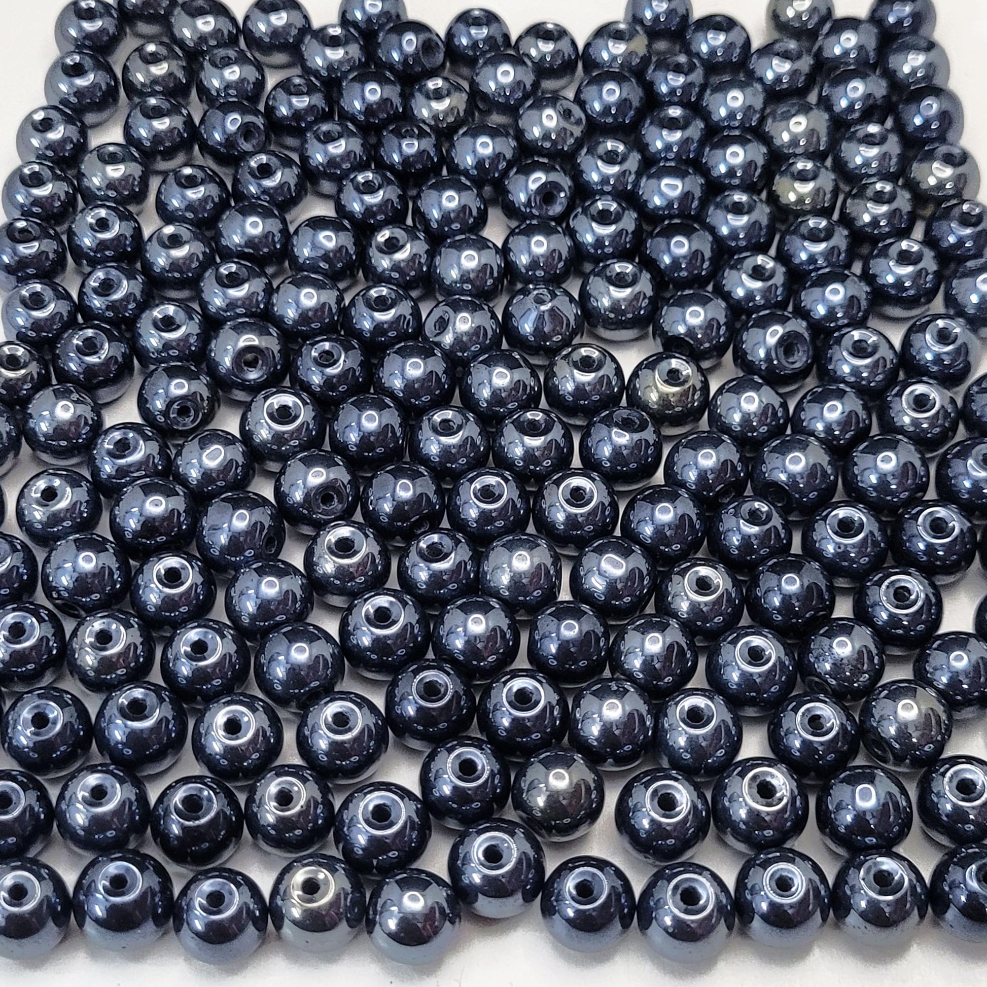 Black and multicolour 8mm beads help shape a polished result for bracelet making, necklace making and DIY jewellery projects.