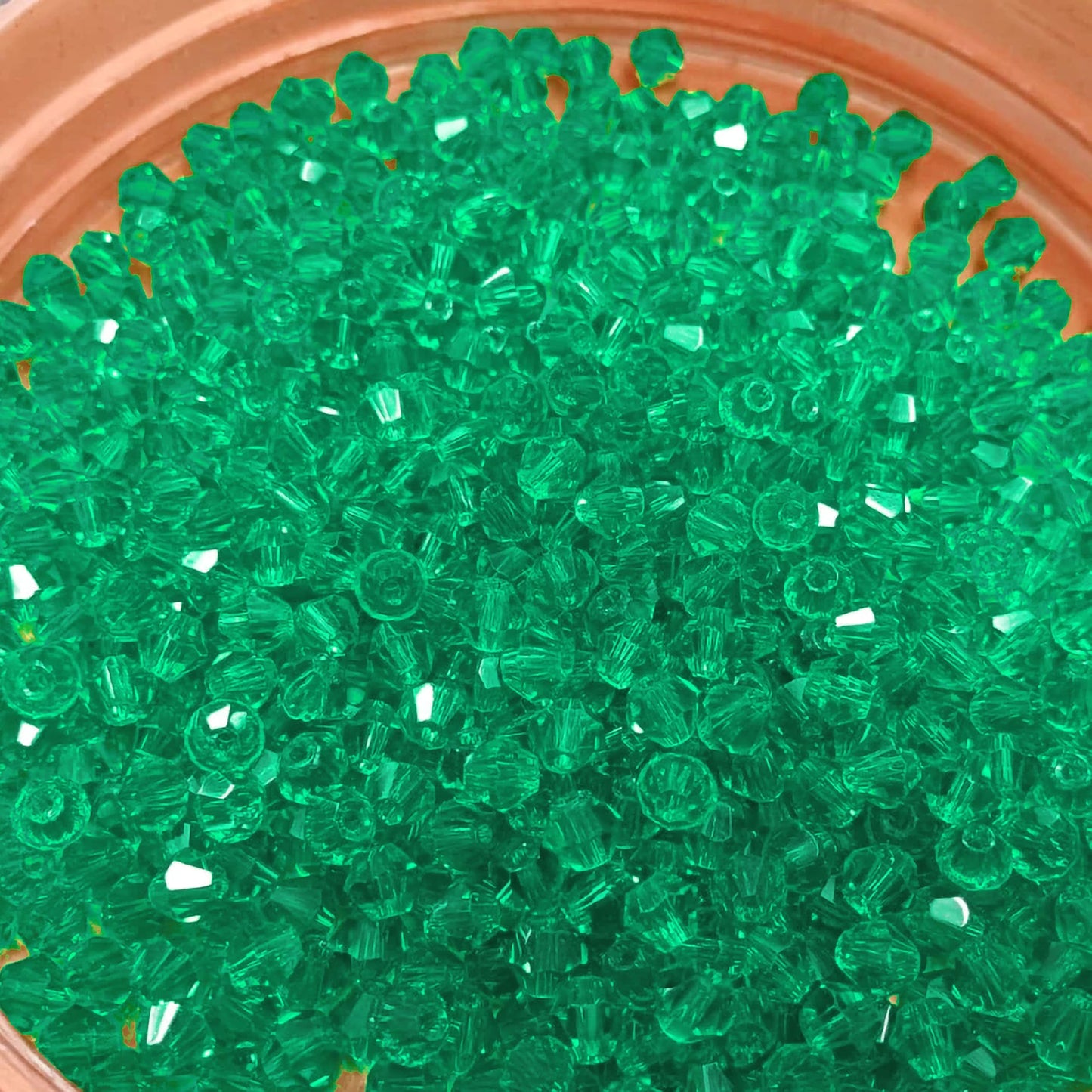Emerald Bicone Acrylic Plastic Crystal-like Beads. Main product image showing the full assortment for jewelry making and craft work.