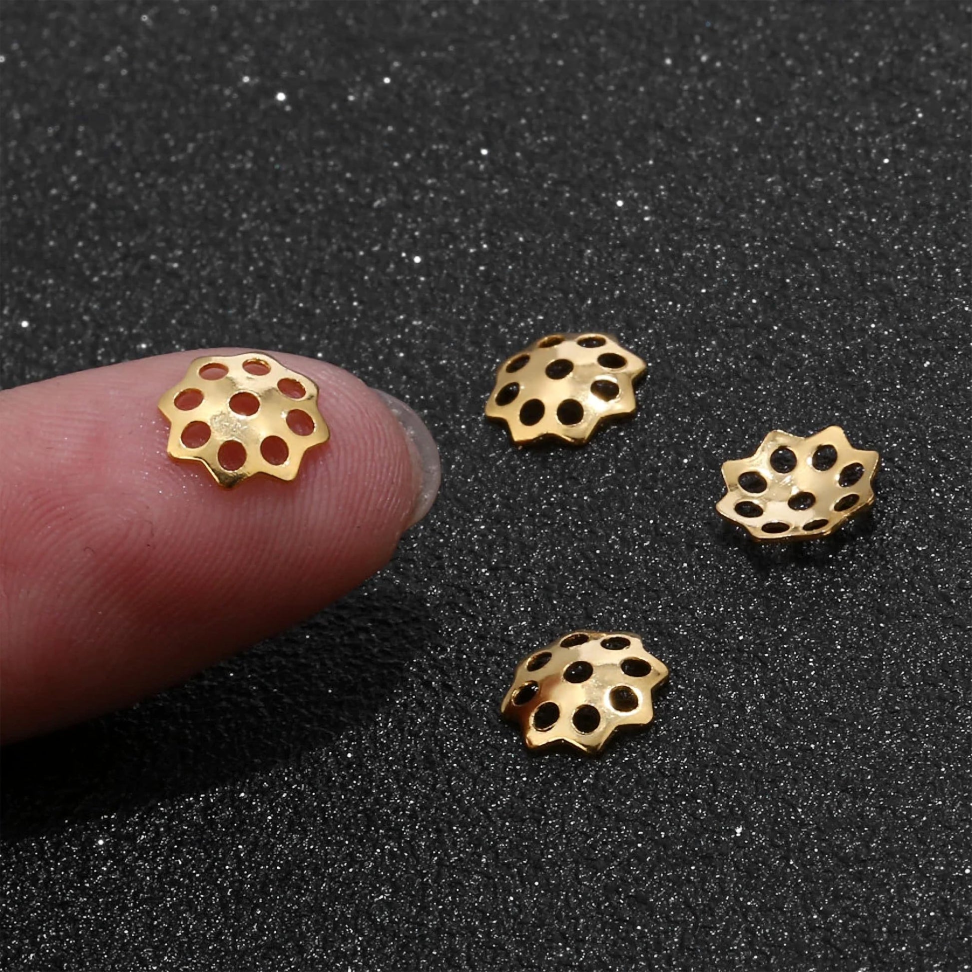 Use jewelry-ready petal bead caps to add clean detail to saree kuchu craft and jhumka making.