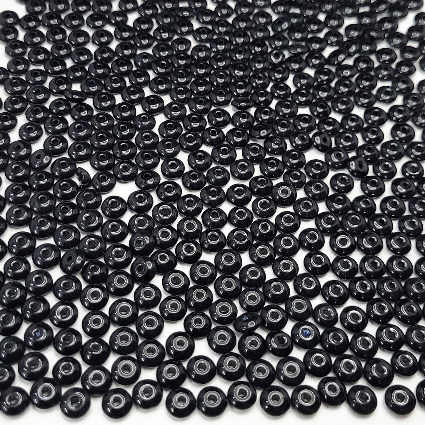 Clean decorative look with black detail comes through clearly in black and white 3mm,4mm,6mm,8mm beads for bracelet making, necklace making and DIY jewellery projects.