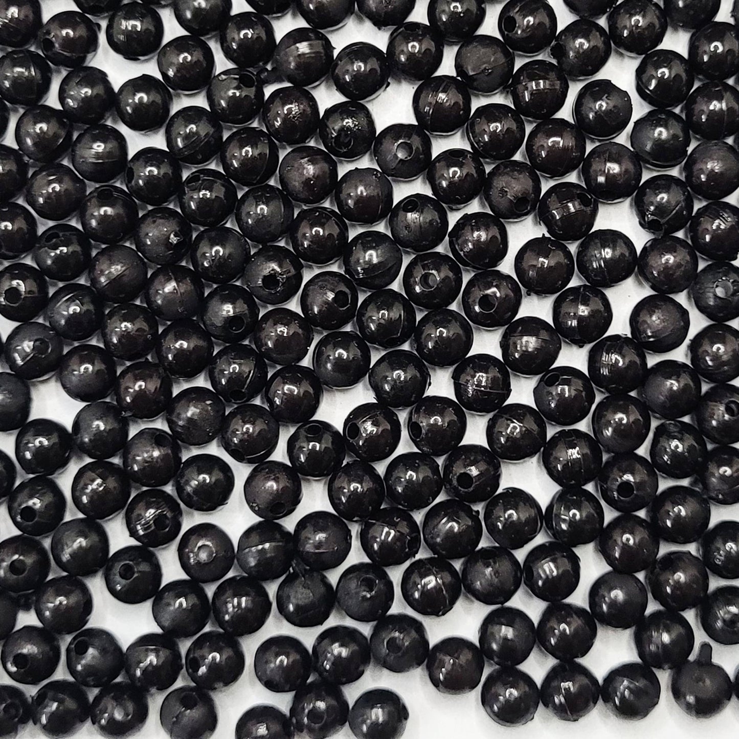 When bracelet making, necklace making and DIY jewellery projects needs a clean decorative look with black detail, black and multicolour 8mm beads work well.