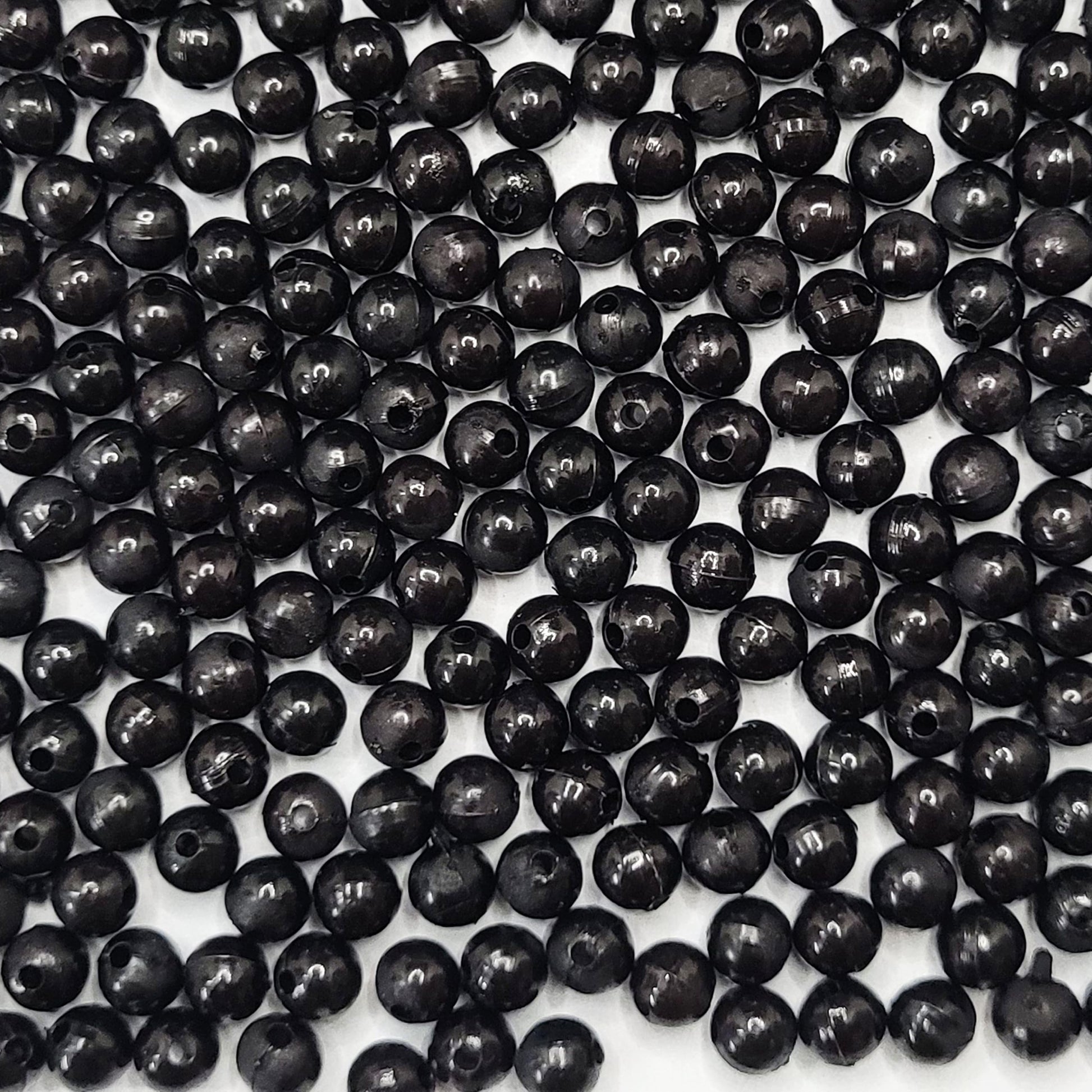 When bracelet making, necklace making and DIY jewellery projects needs a clean decorative look with black detail, black and multicolour 8mm beads work well.