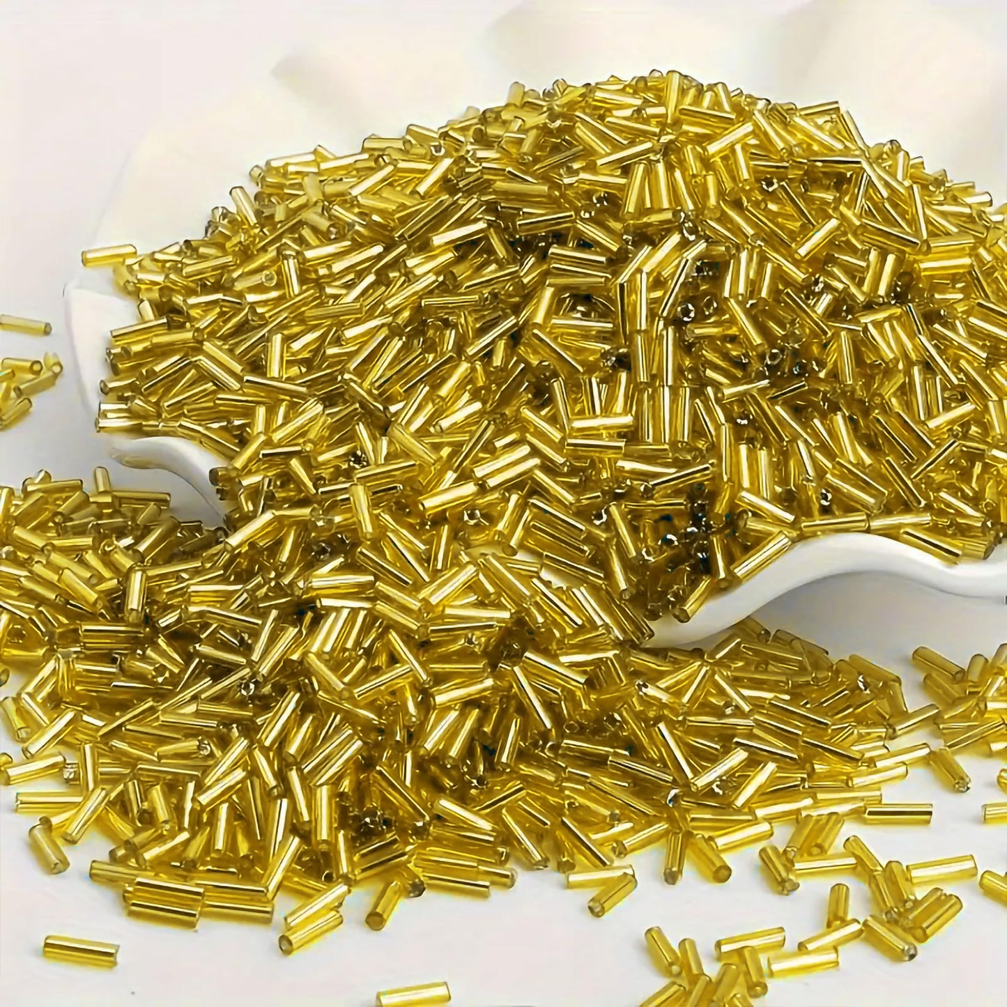 Clean comes through clearly in yellow and silver 5mm bugle small cut cylinder silverline tubes 5mm shiny for DIY craft projects, creative hobby work and decorative handmade designs.