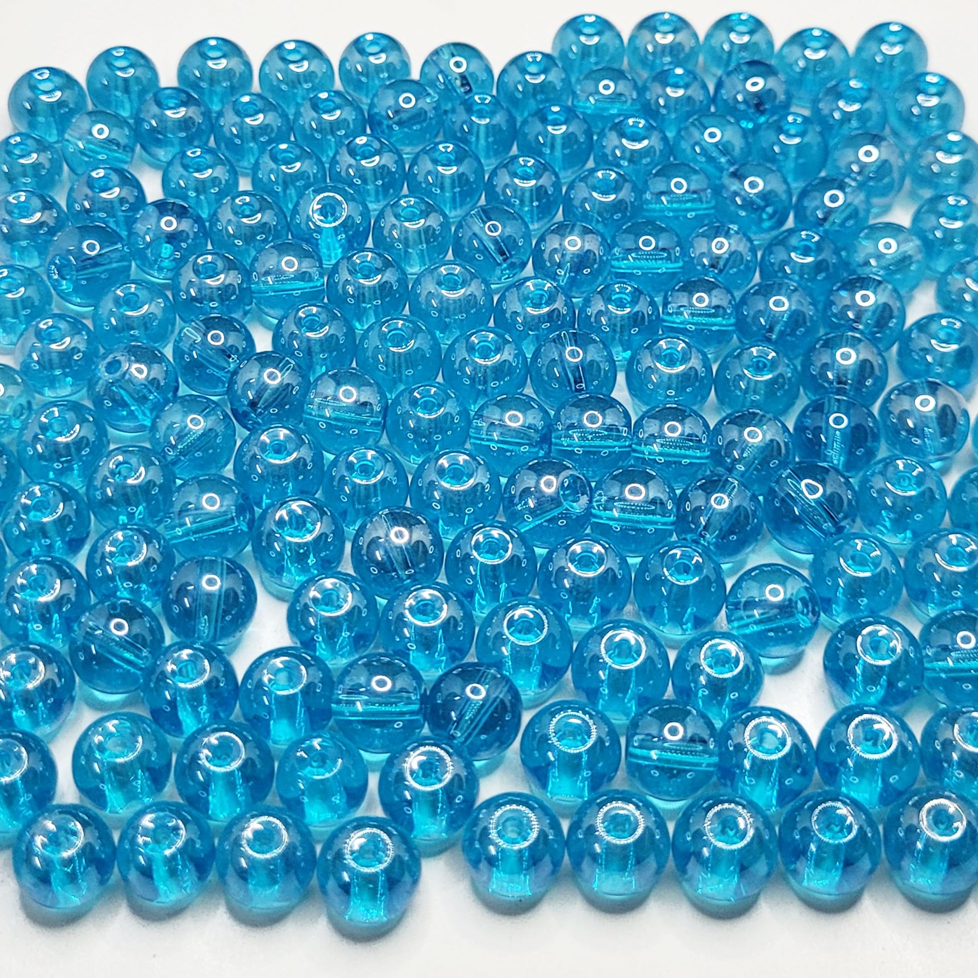 To add a clean decorative look, place sea blue and multicolour 8mm beads into bracelet making, necklace making and DIY jewellery projects.
