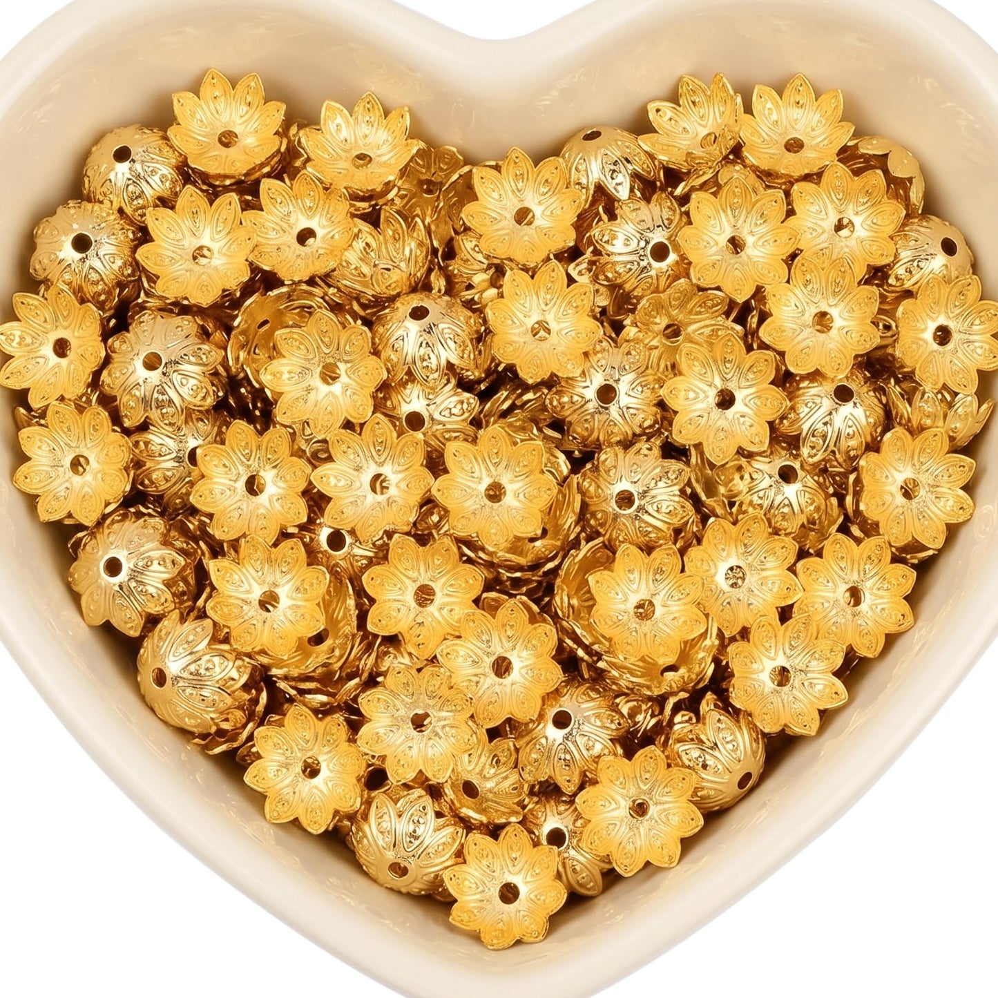 Give handmade jhumka making a fresh accent through golden petal bead caps.