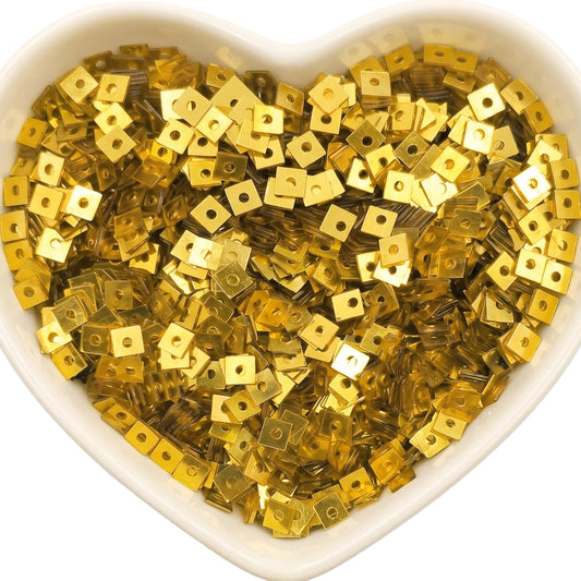 Use 3mm gold square embroidery sequins to add clean detail to aari embroidery and maggam work.
