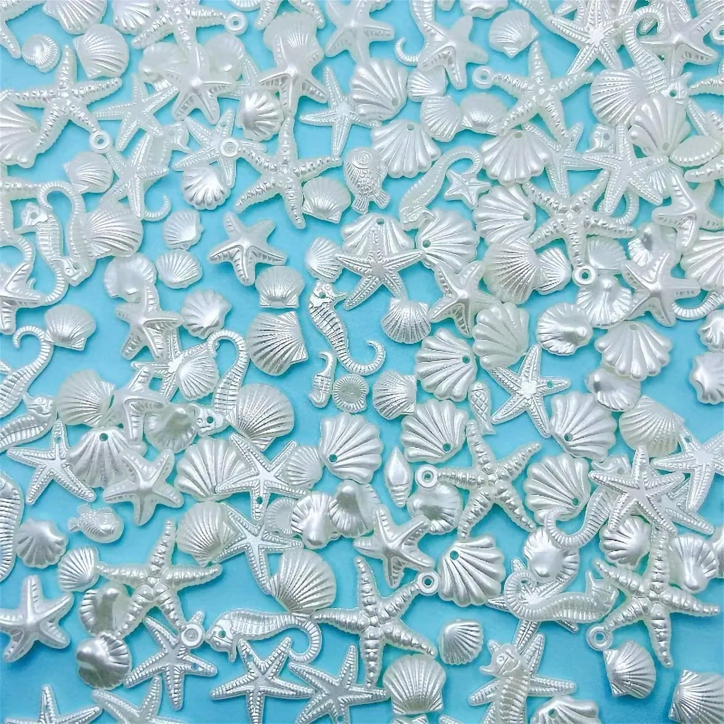 Offwhite Acrylic Beach Charms for DIY Bracelet Making Shell Beads Mix. Assorted layout image showing beads organized for bracelet and DIY projects.