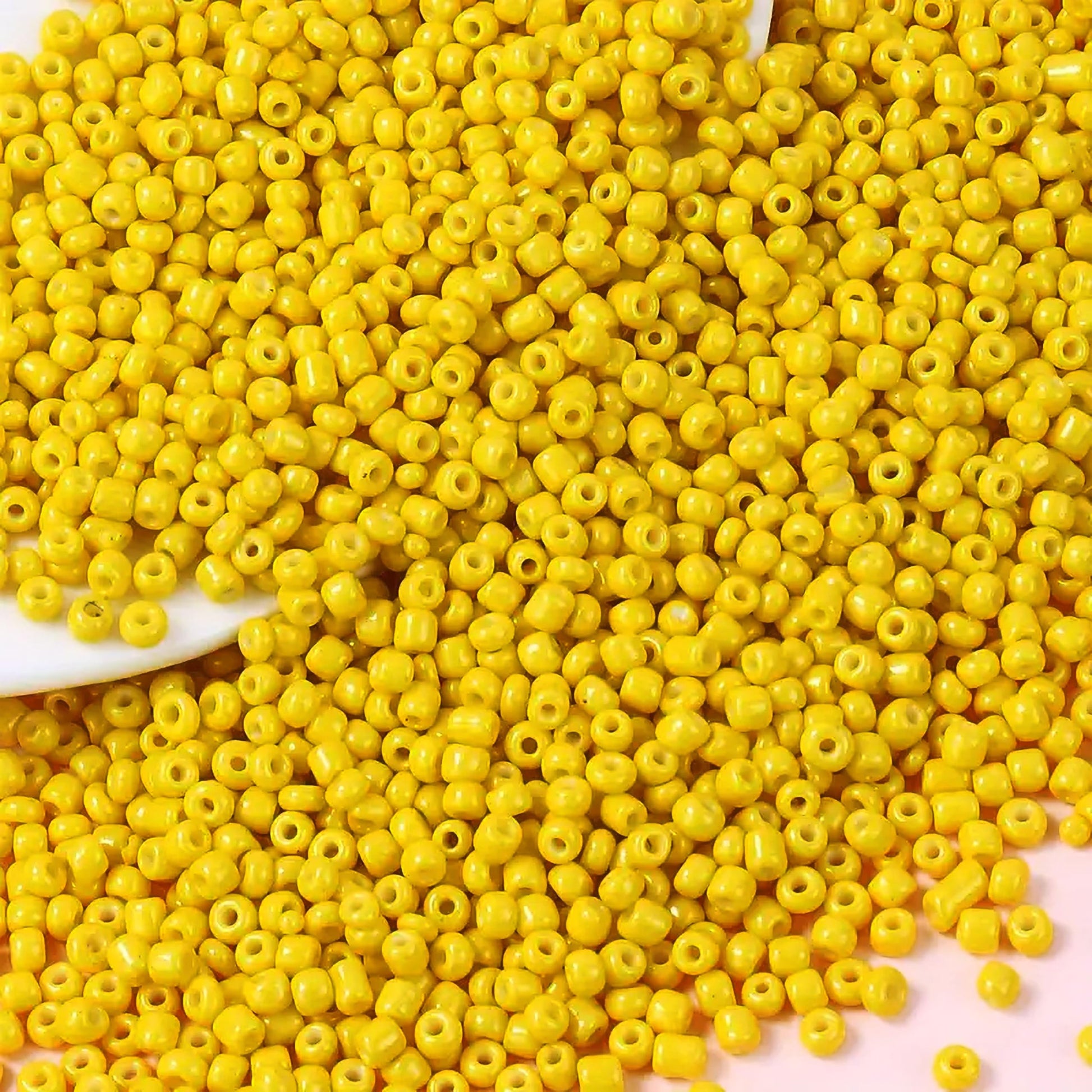 Yellow 2mm and 02mm beads fit into bracelet making, necklace making and DIY jewellery projects without making the design feel heavy.