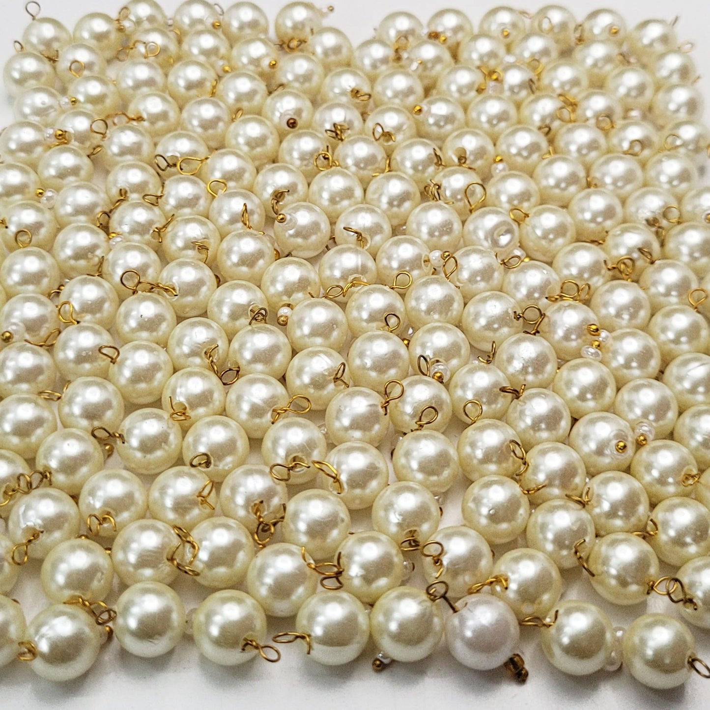 Clean decorative look makes offwhite and multicolour 8mm beads stand out in bracelet making, necklace making and DIY jewellery projects.