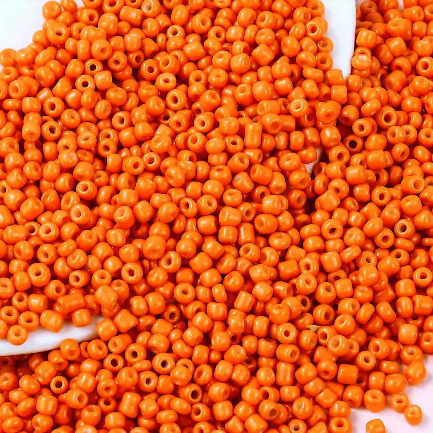 To add a clean decorative look, place orange 4mm and 4 mm beads into bracelet making, necklace making and DIY jewellery projects.
