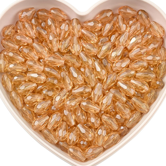 Add graceful dangle accents to earrings and charms with 15x10mm peach faceted teardrop beads.